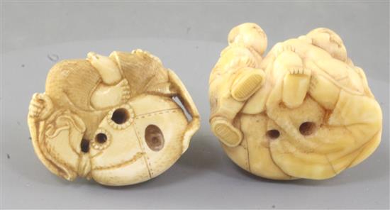 Two Japanese ivory netsuke of Hotei and a boy, Meiji period, width 4.1cm